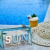 COSHAYSOO Clear Makeup Bag Preppy Sunscreen Pouch Beach Pool Summer Stuff Travel Cosmetic Toiletry Essentials Small Purse Organizer for Women Teenager Girl with Trendy Letter Patch Blue SUN - Image 3
